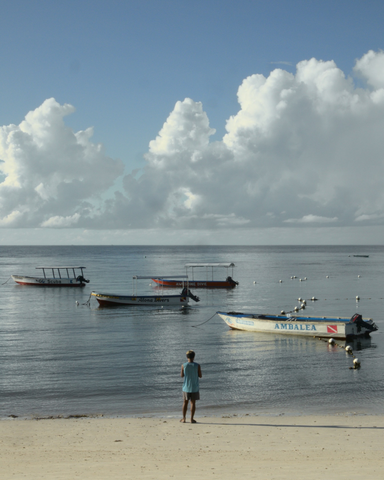 Scene at Panglao Beach, Bohol, Philippines in 2023, shot with Canon EOS M50 Mark II Man standing in front of beach